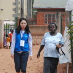 Pregant woman is escorted by RHU staff to get her lab tests re-dpne